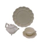 A 19thC Belleek porcelain small teapot, of faceted form, decorated with prunus blossom, impressed