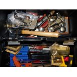 A black plastic Curver toolbox, containing hand tools, hammers, drill brace, saw, staplers,