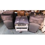 A Zennox MP3 turntable encode system record player, radio, CD player and twin cassette player,