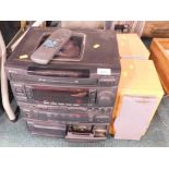 An Aiwa Z1800 karaoke compact disc stereo system, CD player, radio, twin tape deck, with remote