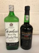 Gordan's Gin bottle and a bottle of Cockburn's Special Reserve port 75cl bottle