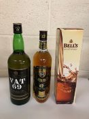 Scotch Whiskey 75cl bottle Grants 12 yr, 1 Litre bottle VAT 69, and a 70cl bottle of Bells in a box