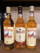 Scotch Whiskey, 2 x 70cl bottles of The Famous Grouse and a 70cl bottle of Bells Original