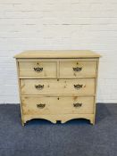 A small Victorian stripped pine chest of drawers