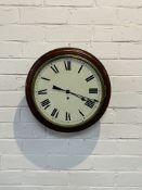 A 19th century mahogany circular wall clock