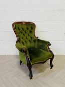 A large Victorian mahogany framed spoon back armchair