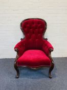 A Victorian mahogany framed spoon back armchair