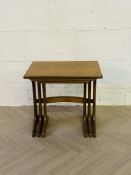A set of three mid century teak nesting tables by G-Plan