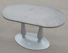 1 x Oval Commercial Bistro Table Featuring a Heavy Duty Metal Twin Pedestal Base and Stonecast Top -