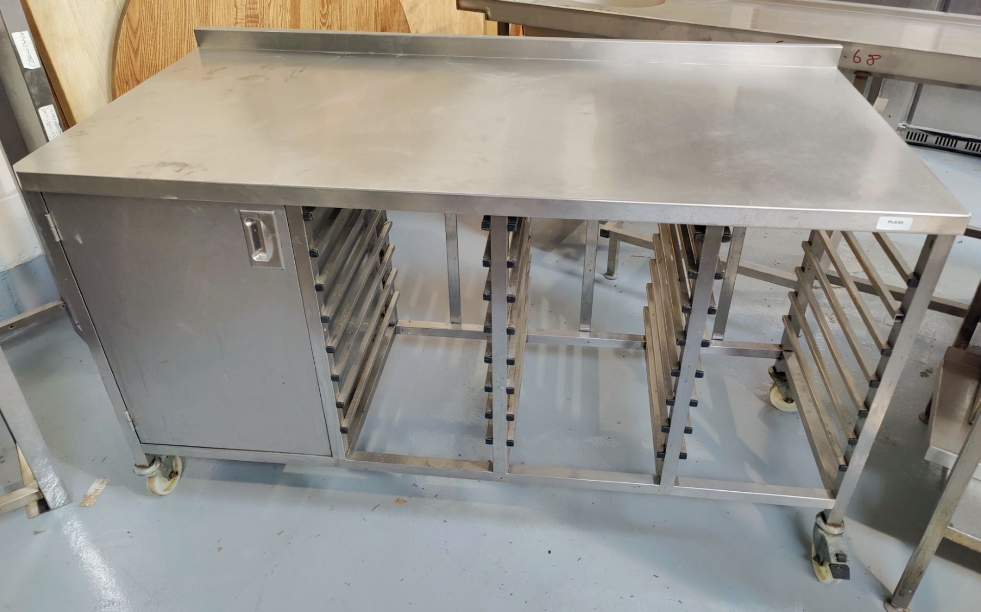 1 x Stainless Steel Prep Table Featuring Cupboard Storage and 21 Tray Racks - Dimensions: H91 x W162