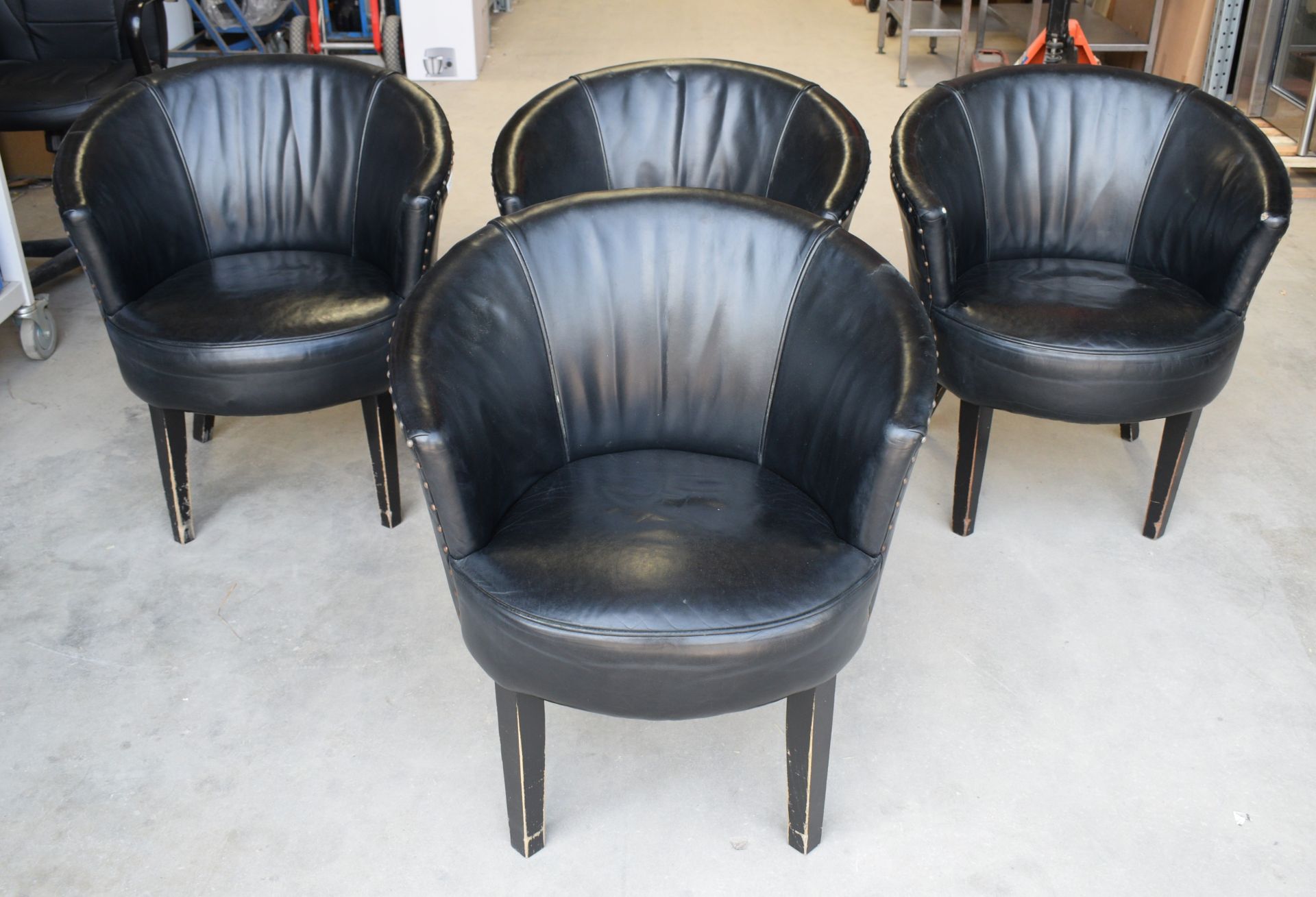 4 x Contemporary Barrel Chairs Upholstered in Black Leather with Studded Backs and Wooden Legs