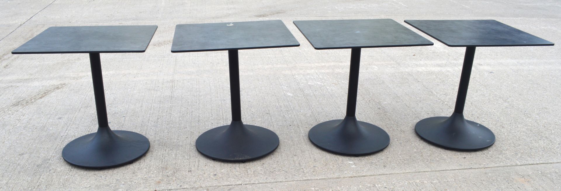 4 x Restaurant Tables Featuring Stone Effect Tops and Black Tulip Pedestals - Dimensions: H75