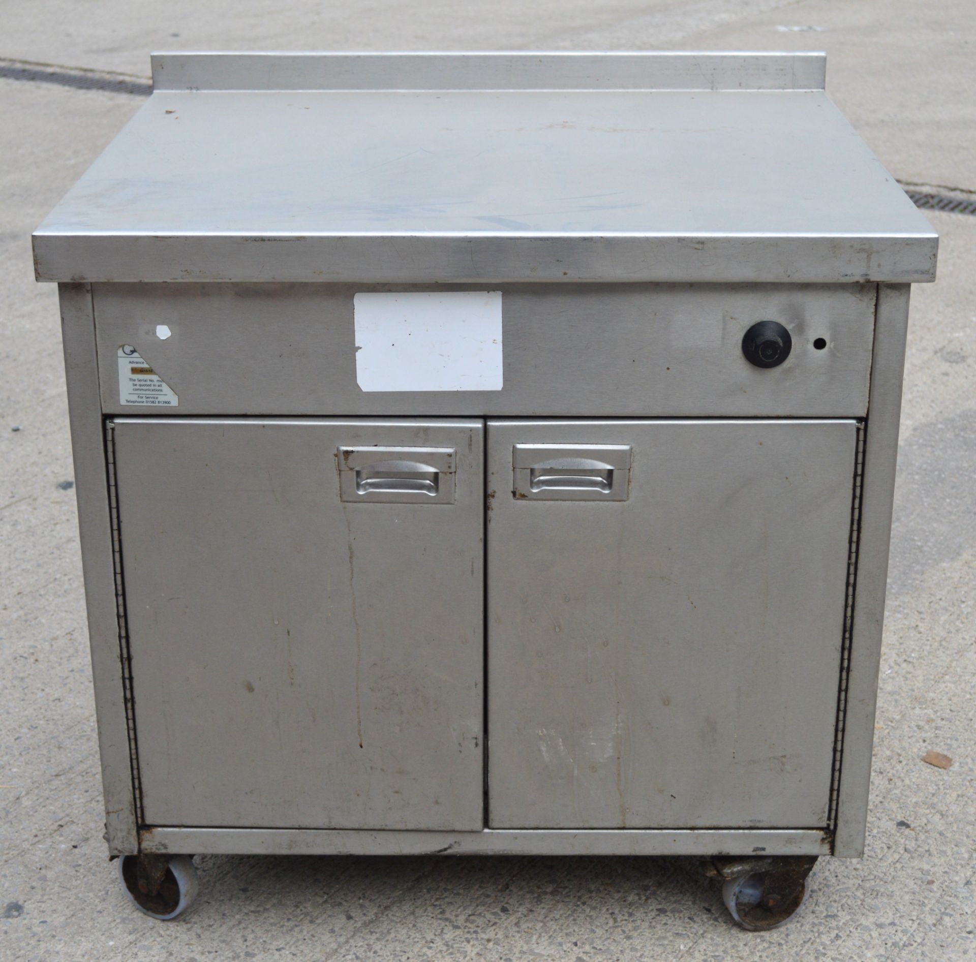 1 x Stainless Steel Two Door Heated Warming Cabinet with Preparation Surface and Castor Wheels