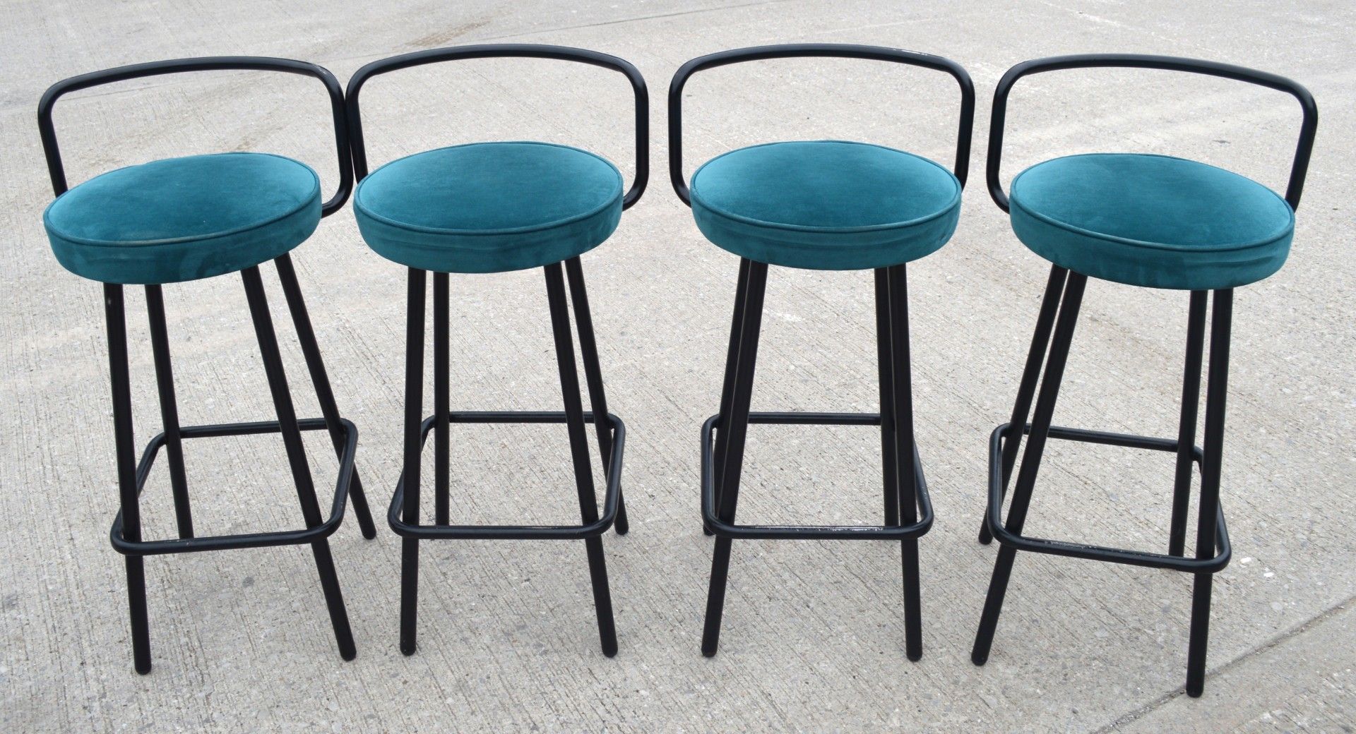 4 x Contemporay Bar Stools Featuring Velvet Teal Seats and Black Frames with Foodrests