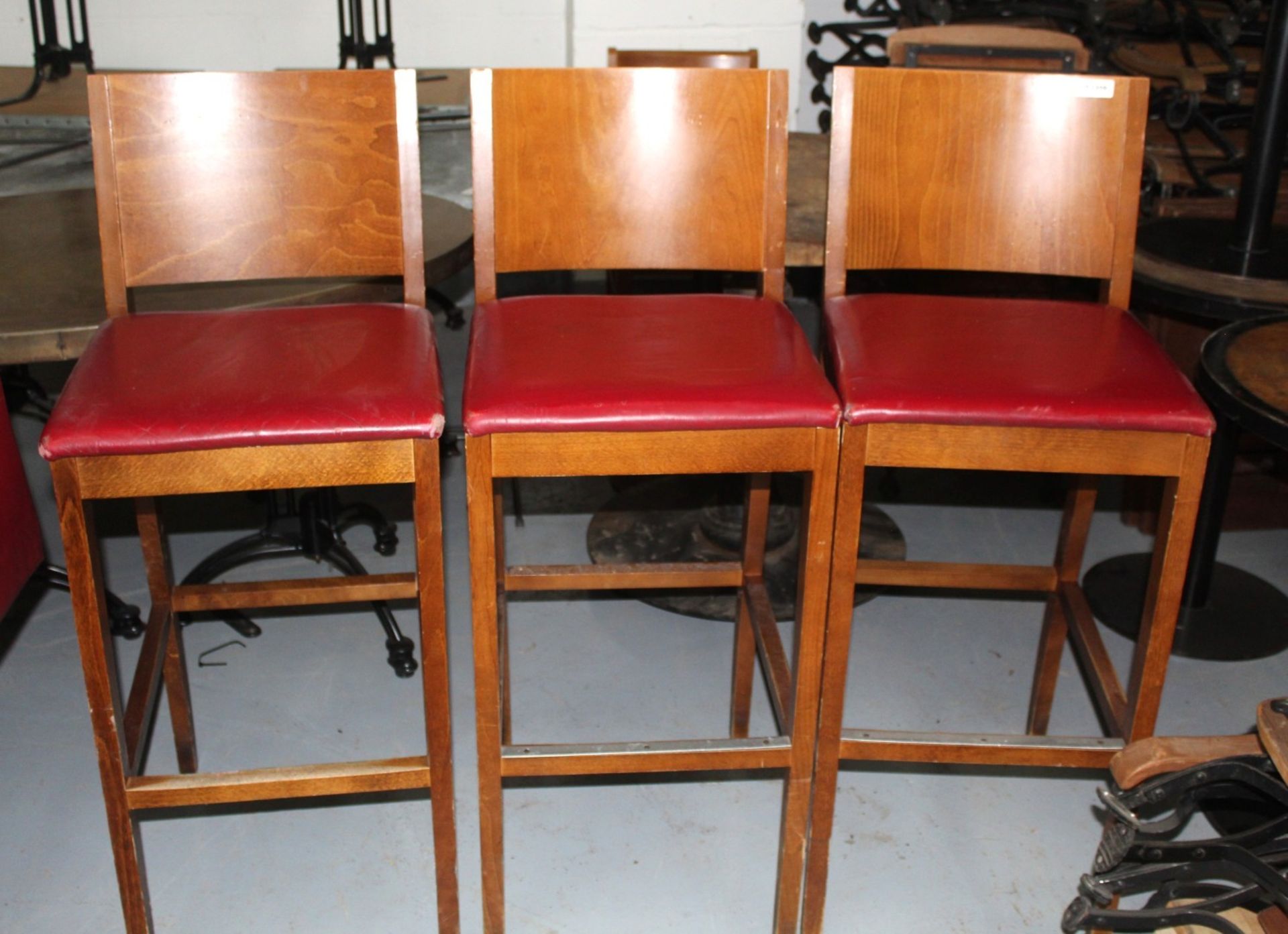 3 x  Restaurant Bar Stools Featuring Wooden Backrests, Footrests and Red Faux Leather Seating Pads - Image 3 of 4
