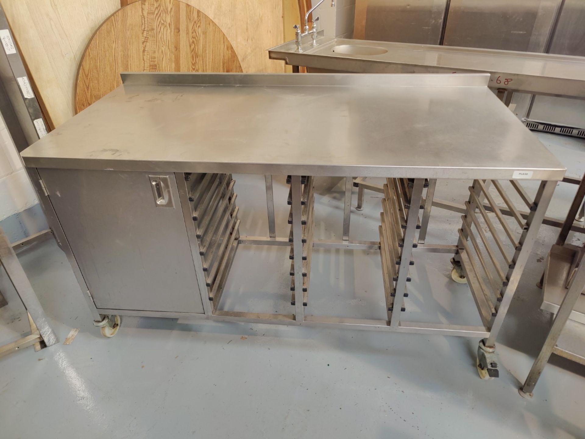 1 x Stainless Steel Prep Table Featuring Cupboard Storage and 21 Tray Racks - Dimensions: H91 x W162 - Image 4 of 5