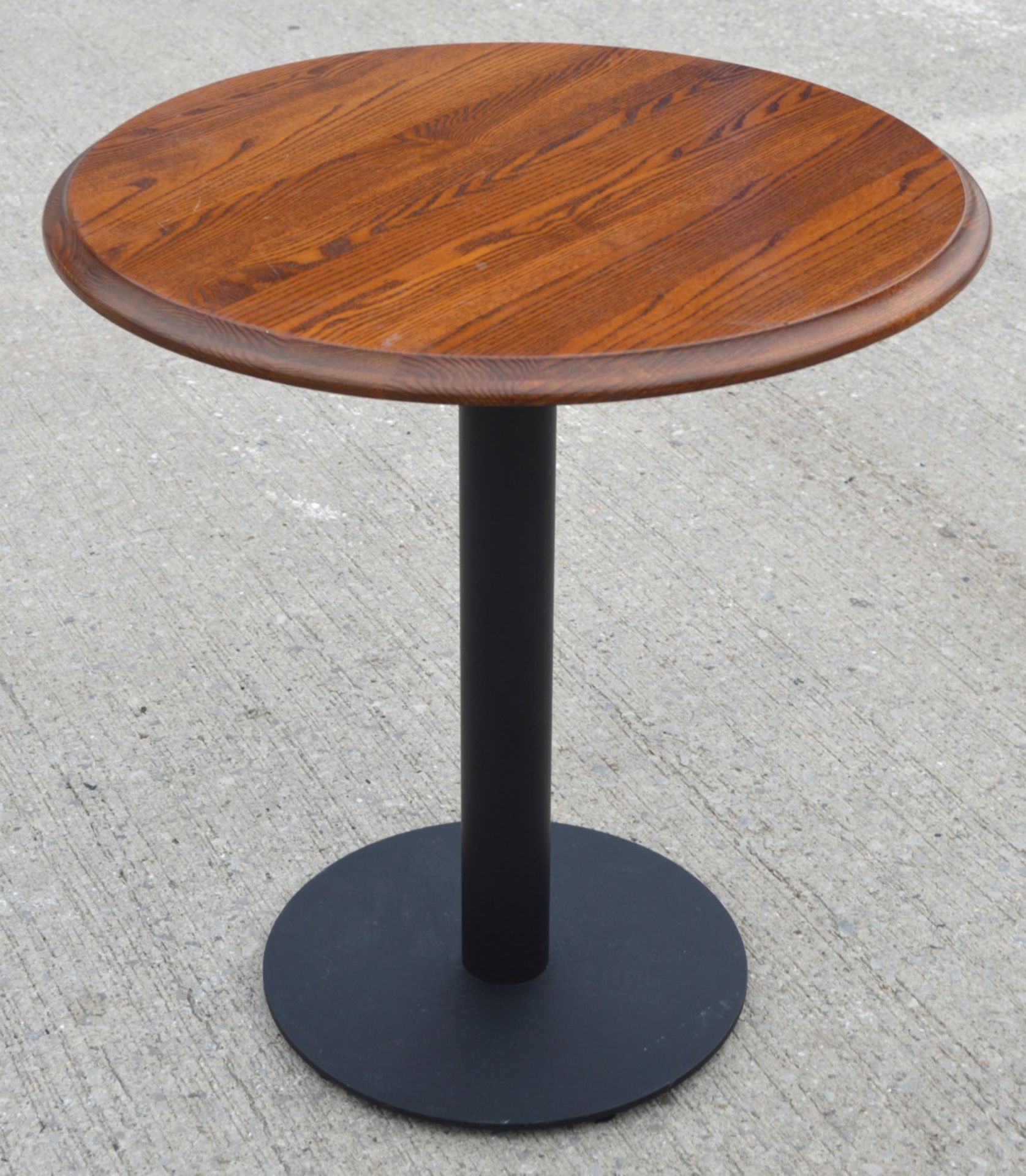 1 x Restaurant Table Featuring a Stained Round Wooden Top and Black Pedestal - Dimensions: H77 x W70