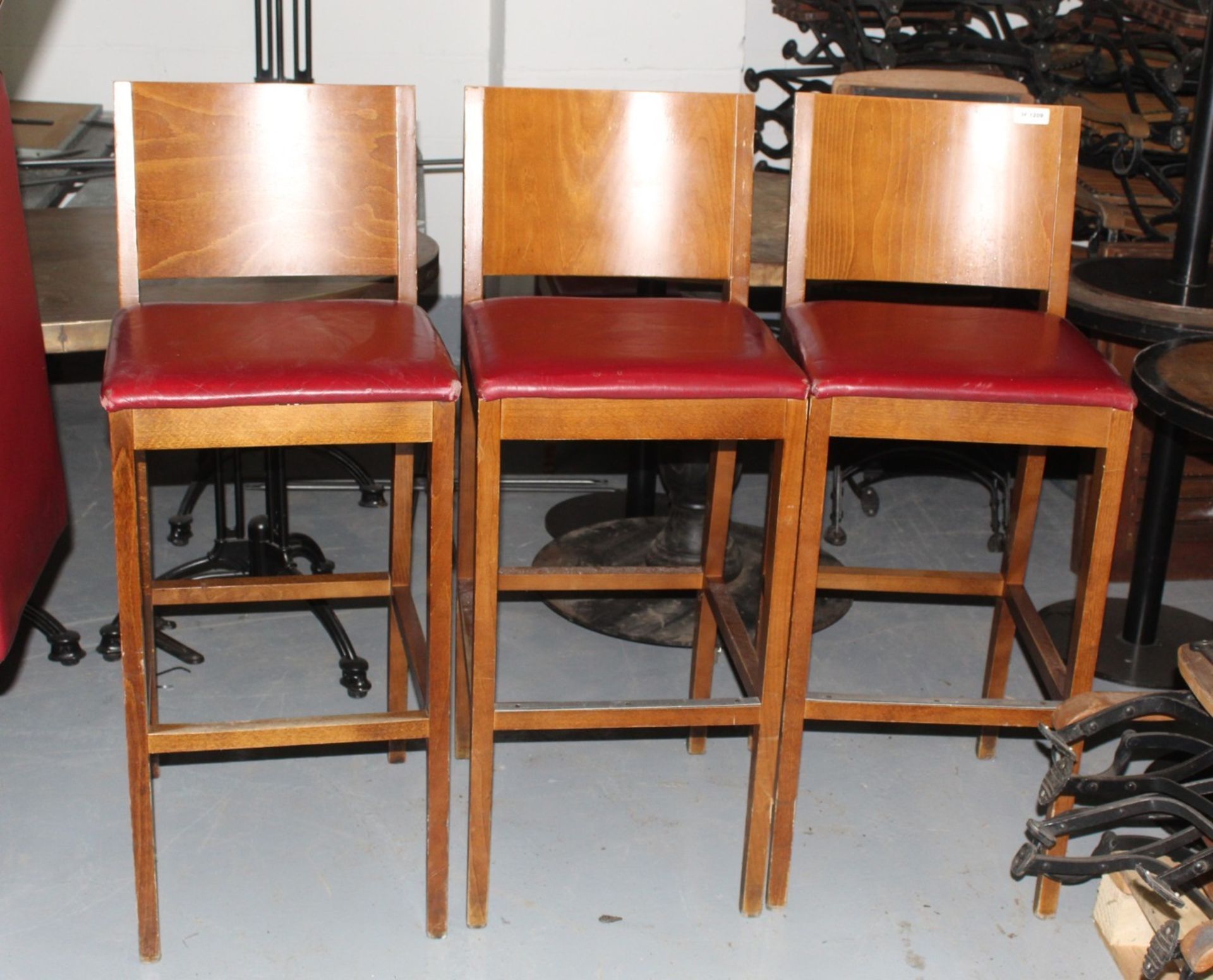 3 x  Restaurant Bar Stools Featuring Wooden Backrests, Footrests and Red Faux Leather Seating Pads