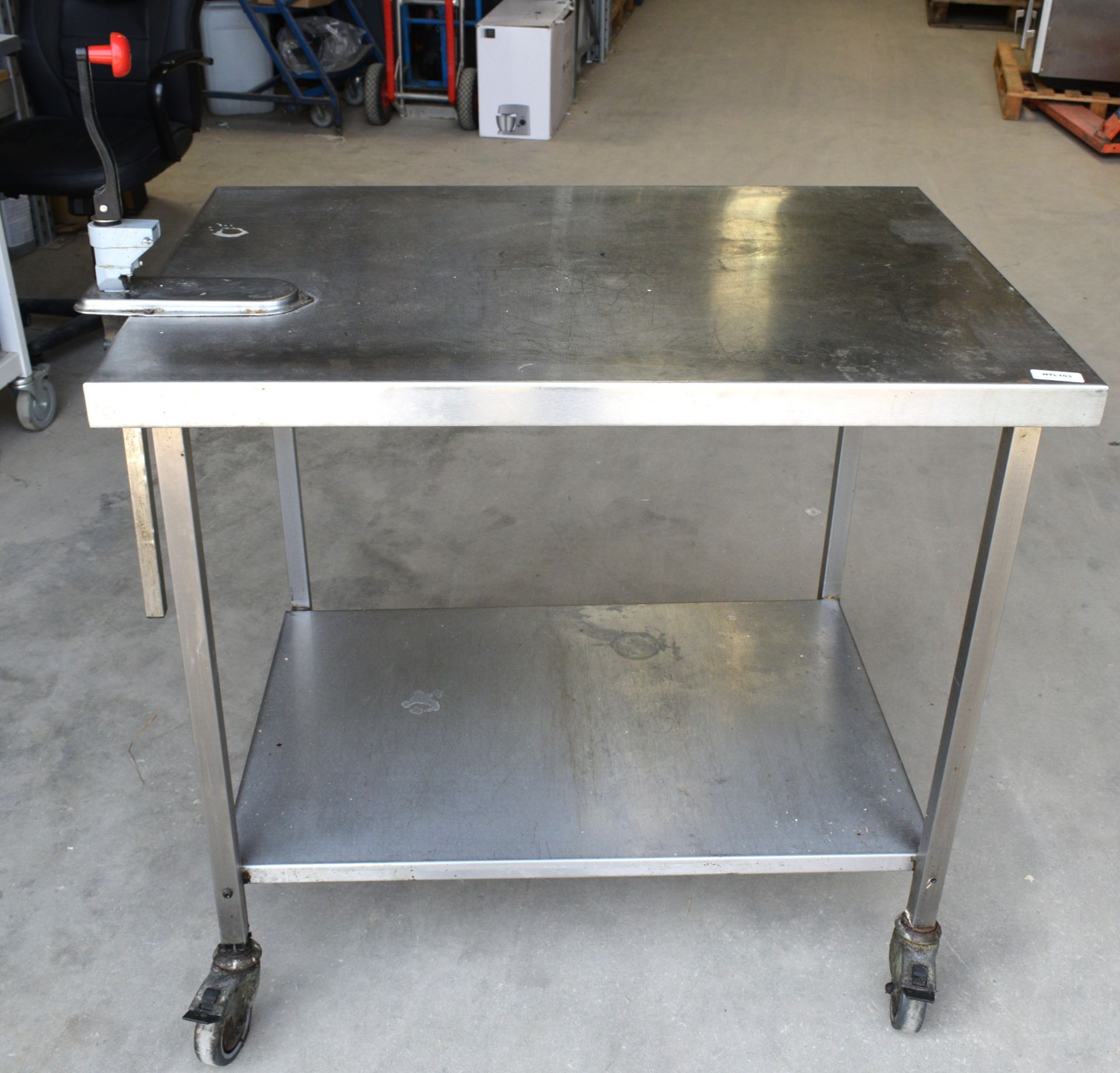 1 x Stainless Steel Mobile Prep Table Featuring Castor Wheels, Can Opener and Undershelf