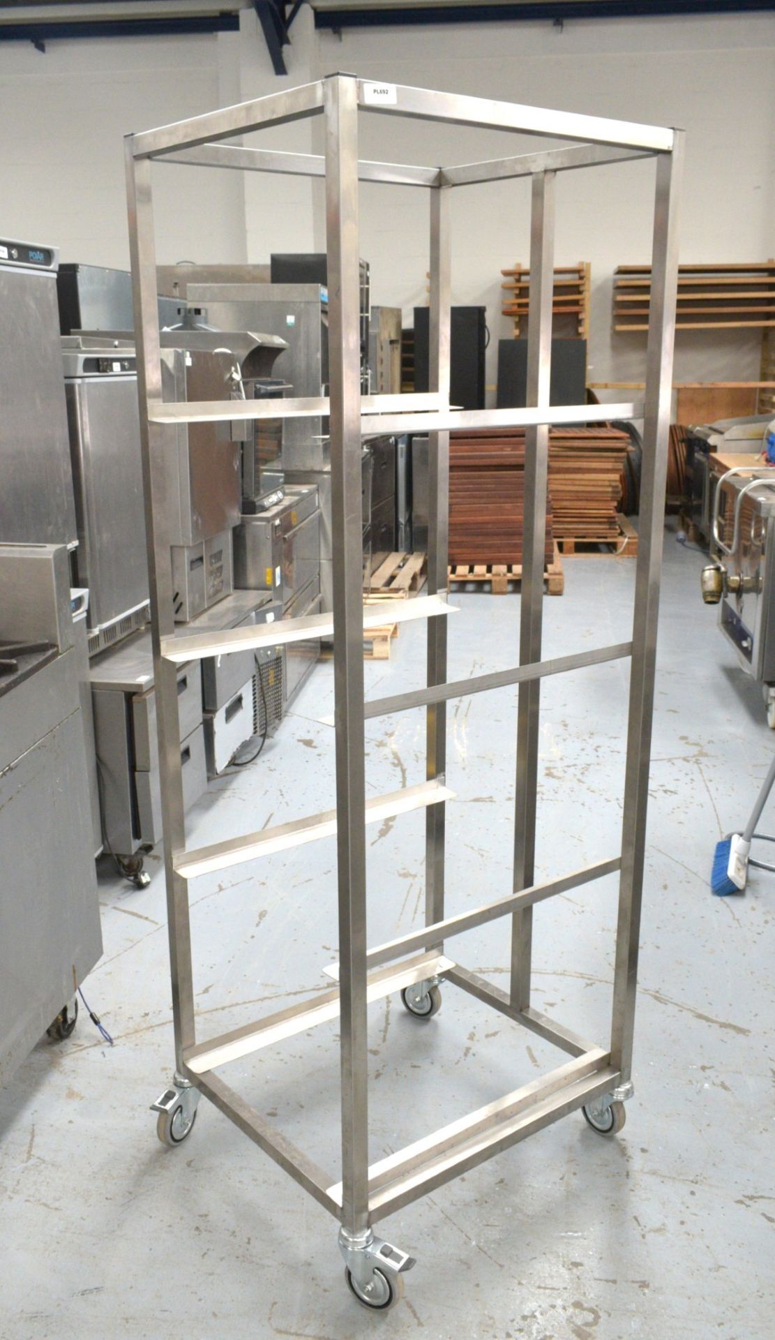 1 x Stainless Steel Mobile Tray Rack on Castors - Dimensions: H180 x W57 x D66 cms