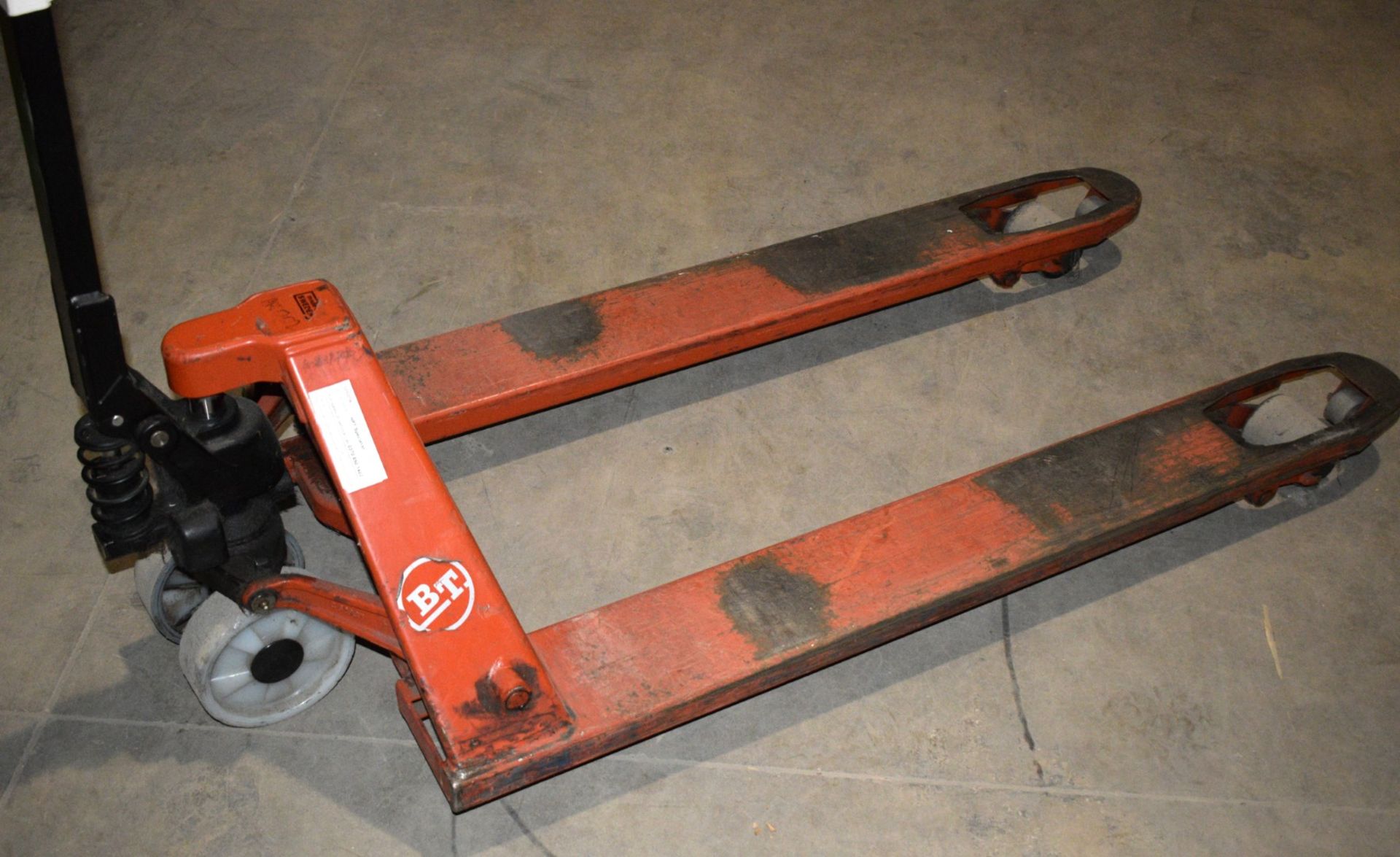 1 x BT Pallet Pump Truck - Fork Length: 120cm x Fork Width: 68cm - Good Working Order