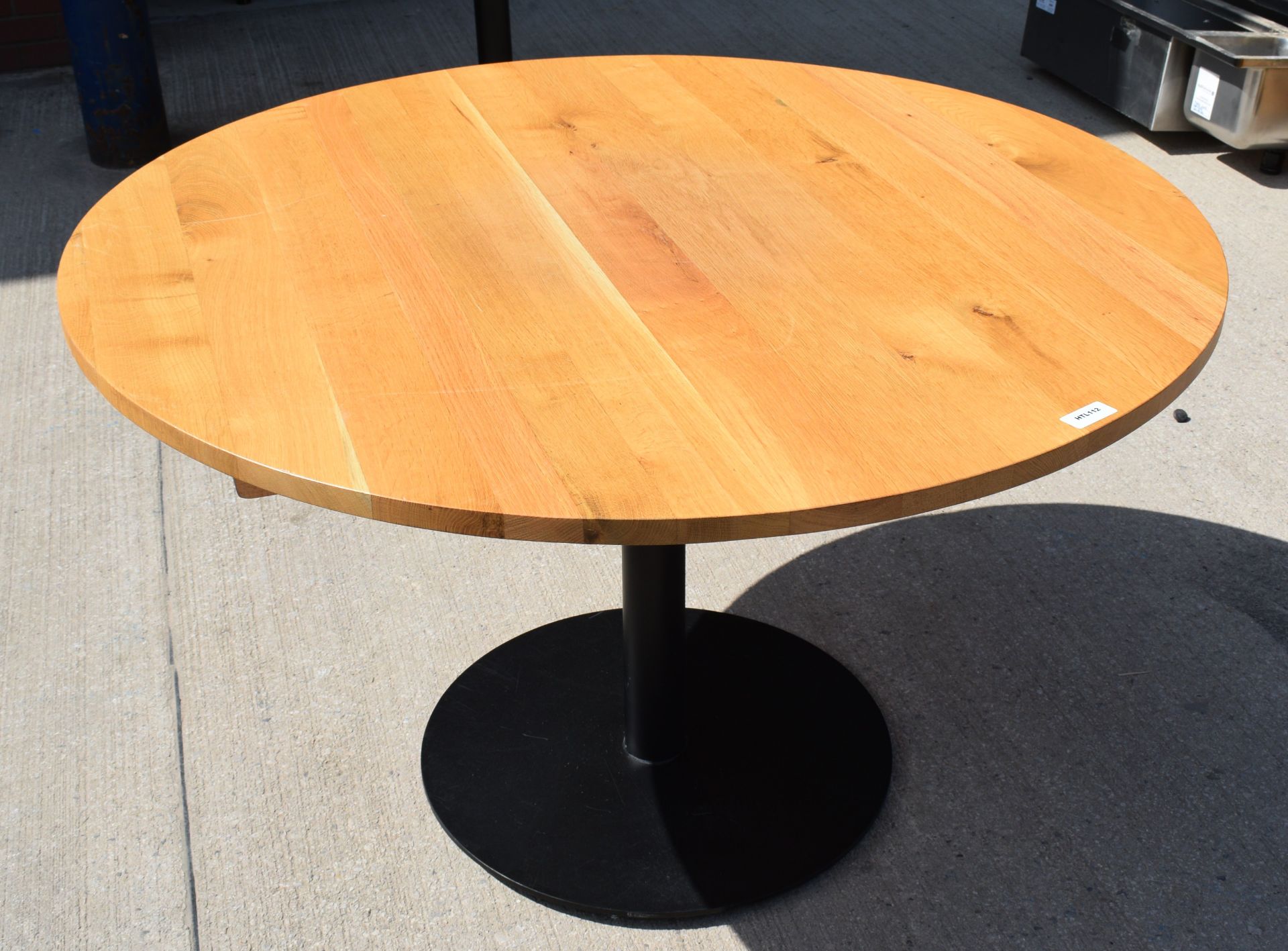 1 x Solid Oak Restaurant Dining Table with a Black Pedestal Base - Dimensions: H74 x W120 x D120 cms