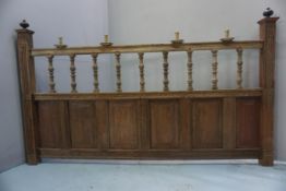 Oak choir screen consisting of six panels, surmounted by a row of balusters with a railing. Four