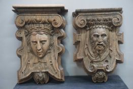 Pair of oak beam soles. Architectural corbels with a detailed depiction of a man and woman. Northern