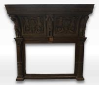 Monumental, richly sculpted, curved fireplace hood in oak, special carving with caryatids and