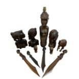 Quantity of African hardwood collectables to include busts, table lamp, walking sticks, etc. (Lamp