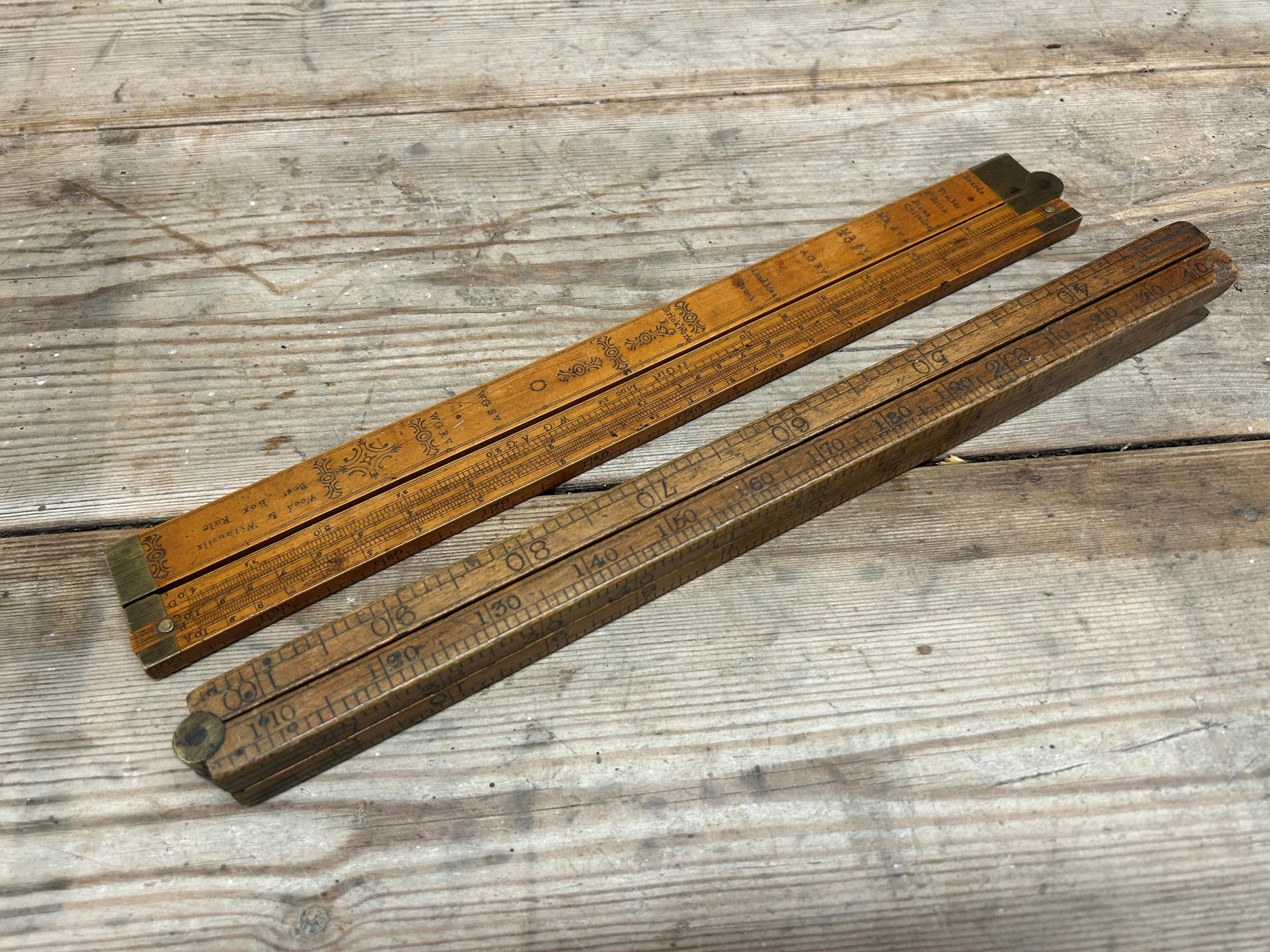 Two antique rulers, the folding rule 'best box rule' by Wood ...