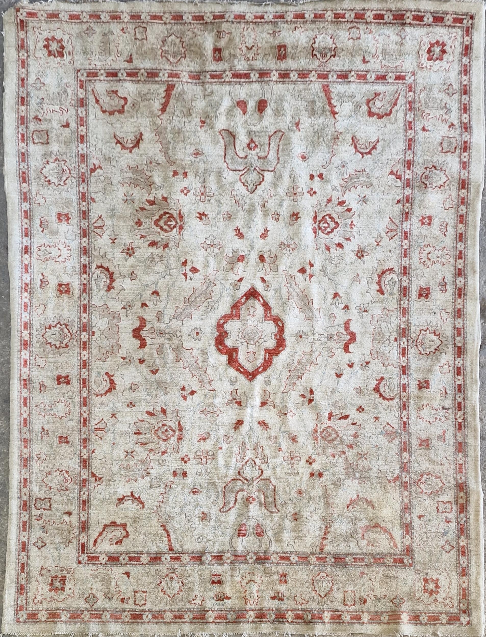 Persian Ziegler carpet on a cream ground, 297cm x 212cm
