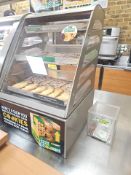 Three slotted cookie display with stainless steel base