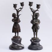 Paar Bronzekinder-Kerzenleuchter