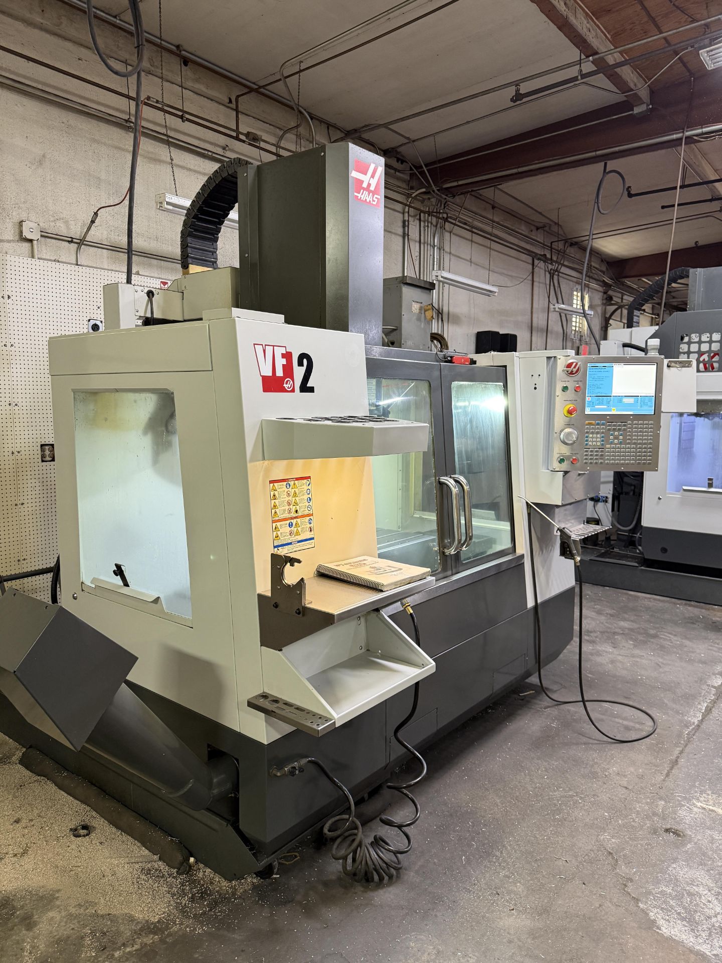 2014 Haas VF-2 CNC Vertical Machining Center, 20+1 Tool Changer, Haas Control, Chip Auger, HIL, P-