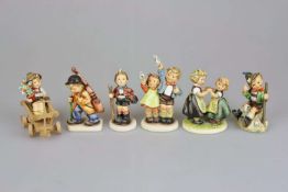 Sechs Hummelfiguren
