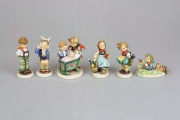 Sechs Hummel Figuren