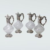 4 Schwere Kristallkaraffen mit Silbermontierung