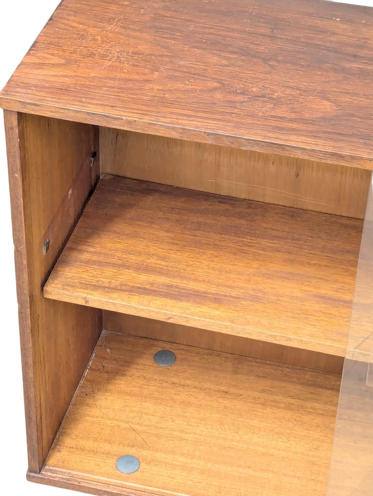 A Mid Century teak bookcase by Avalon. 114x31x74.5cm - Image 2 of 3