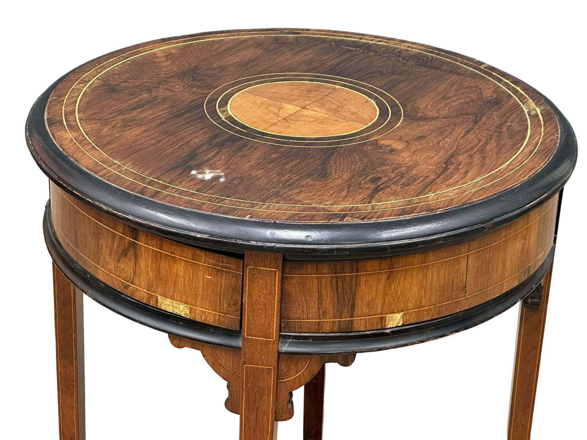 An Early 20th Century Sheraton Revival inlaid mahogany revolving side table with drawers. Circa - Image 7 of 9