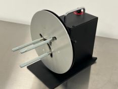 Datamax-O'Neil label rewinder. Model #: DMX-REW1; S/N: 2122VR061.