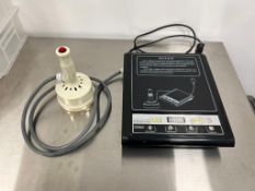 GLF-500F handheld electromagnetic induction sealer.