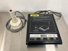 GLF-500F handheld electromagnetic induction sealer.