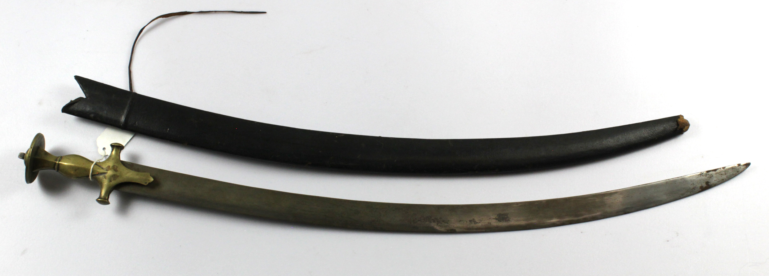 Swords two late 19th century Indian Tulwar both with scabbards.