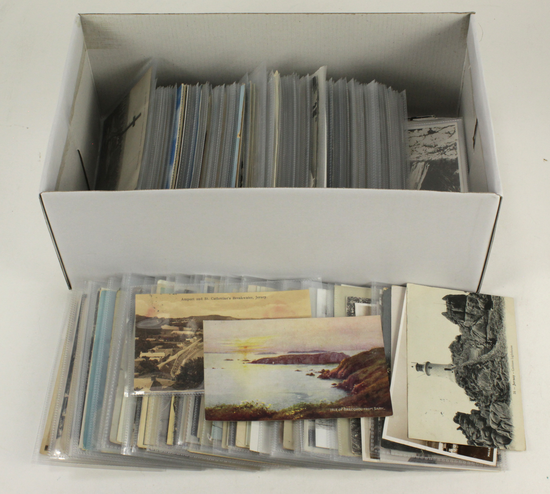 Shoebox of postcards - many different places and some objects. Most are ...