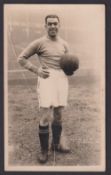 Football postcard, Dixie Dean, Everton F.C., black & white sepia photographic card showing Dean
