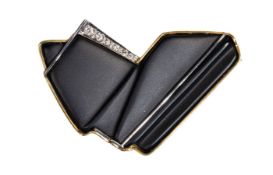 Brosche, GG/WG 585/000, 4 Brillanten ca. 0,06 ct tw/w-si, geschnittener matter Onyx in ...