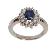 Ring, WG 585/000, zentraler Saphir, ca. 1,0 ct (fac.), 12 Brillanten ca. 0,48 ct w/si, RW ca. ...