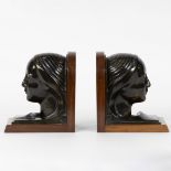 Jan ANTEUNIS (1896-1973), very rare pair of bookends, bronze girls' heads mounted on mahogany, signe