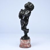 Bronze sculpture of a boy with a fish by the French sculptor Benoît Rougèlet, served as a cigarette